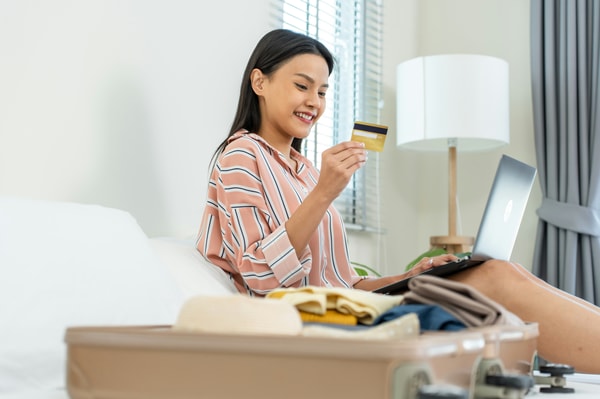 Woman purchasing online travel